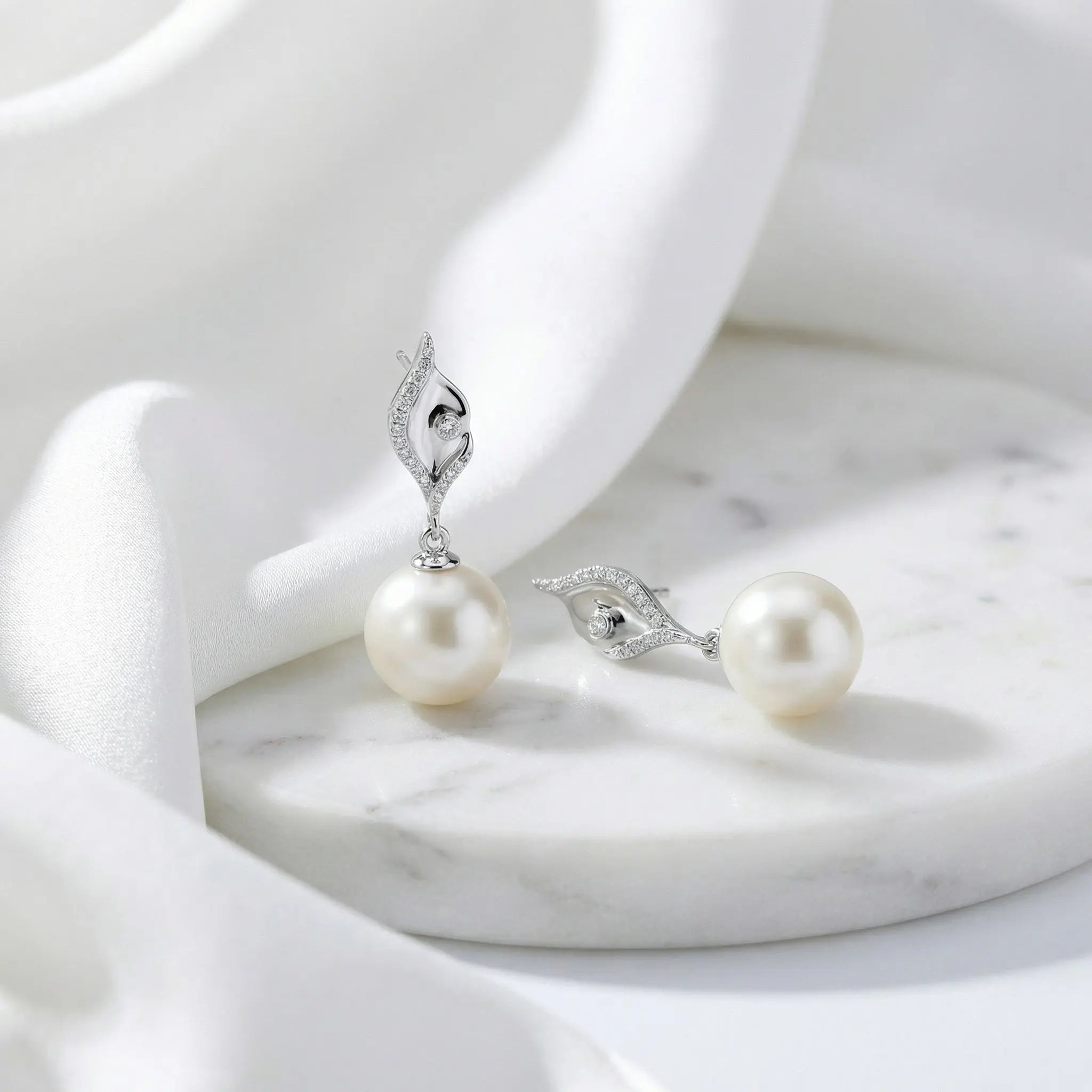 925 Sterling Silver Elegant White Pearl Drop Earrings with CZ Accents and Fluid Silver-Toned Settings