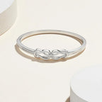 Sterling Silver Diamond Double Knot Bangle Bracelet, 7" (0.25 Cttw, J Color, I3 Clarity)