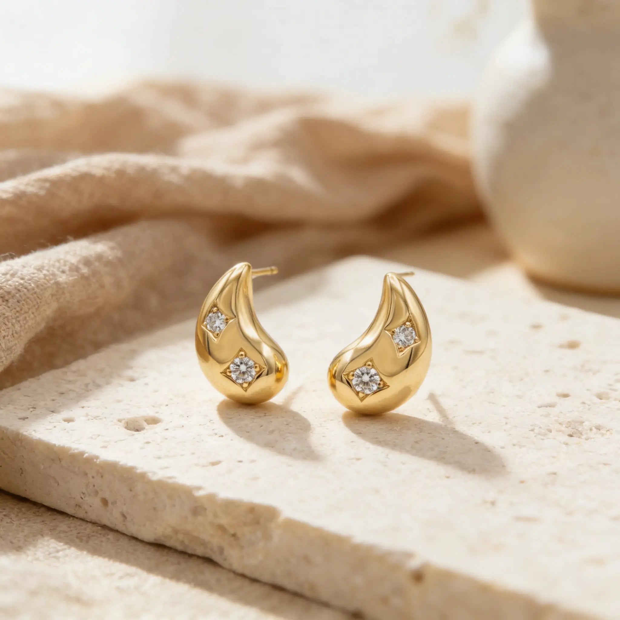 925 Sterling Silver Elegant Tear-Drop Studs Featuring Star-Set Sparkling CZs