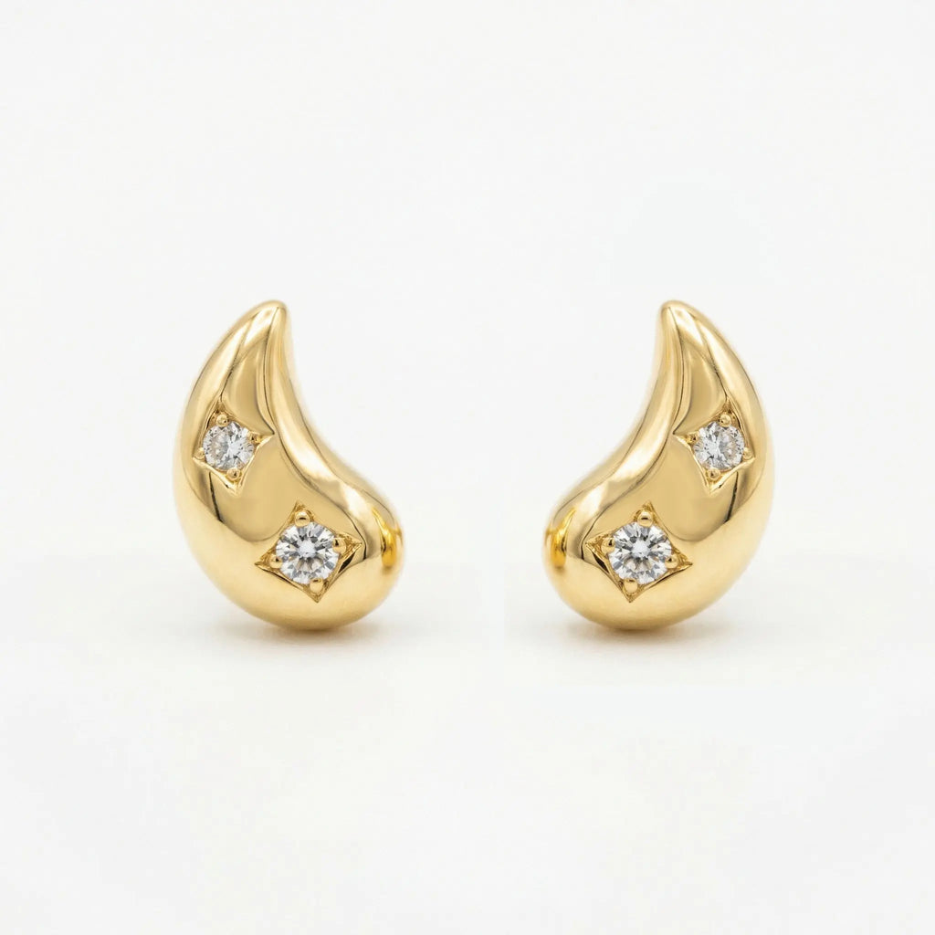 925 Sterling Silver Elegant Tear-Drop Studs Featuring Star-Set Sparkling CZs