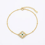 925 Sterling Silver Radiant Emerald and Mother of Pearl Quatrefoil Station Bracelet with Delicate Beading
