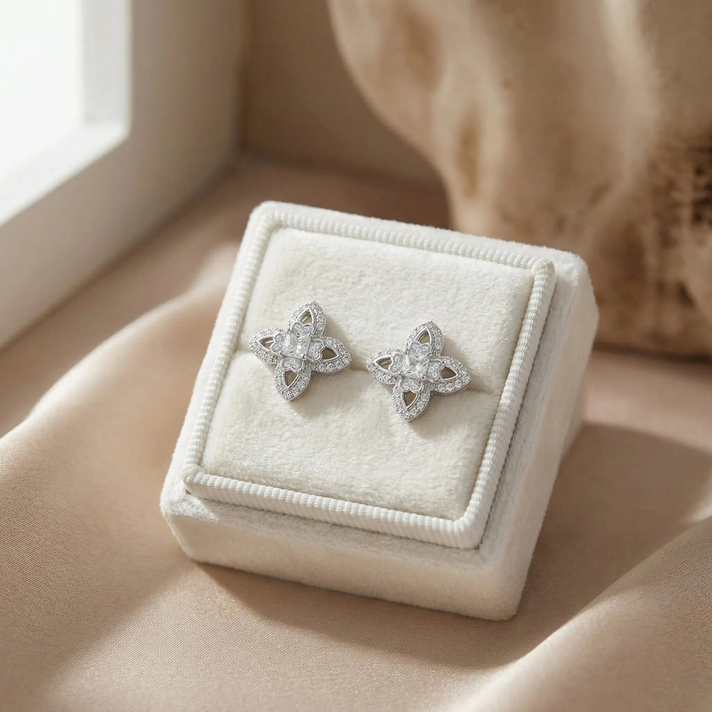 925 Sterling Silver Elegant CZ Clover Stud Earrings with Intricate Filigree Details in Shimmering White Metal