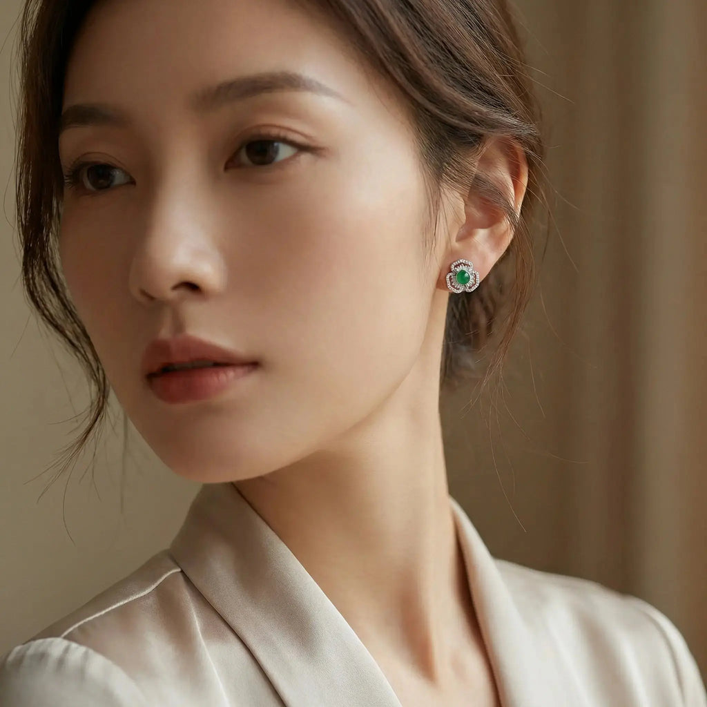 925 Sterling Silver Elegant Green Gemstone Flower Stud Earrings with Shimmering Baguette and Round Accents NP Collection