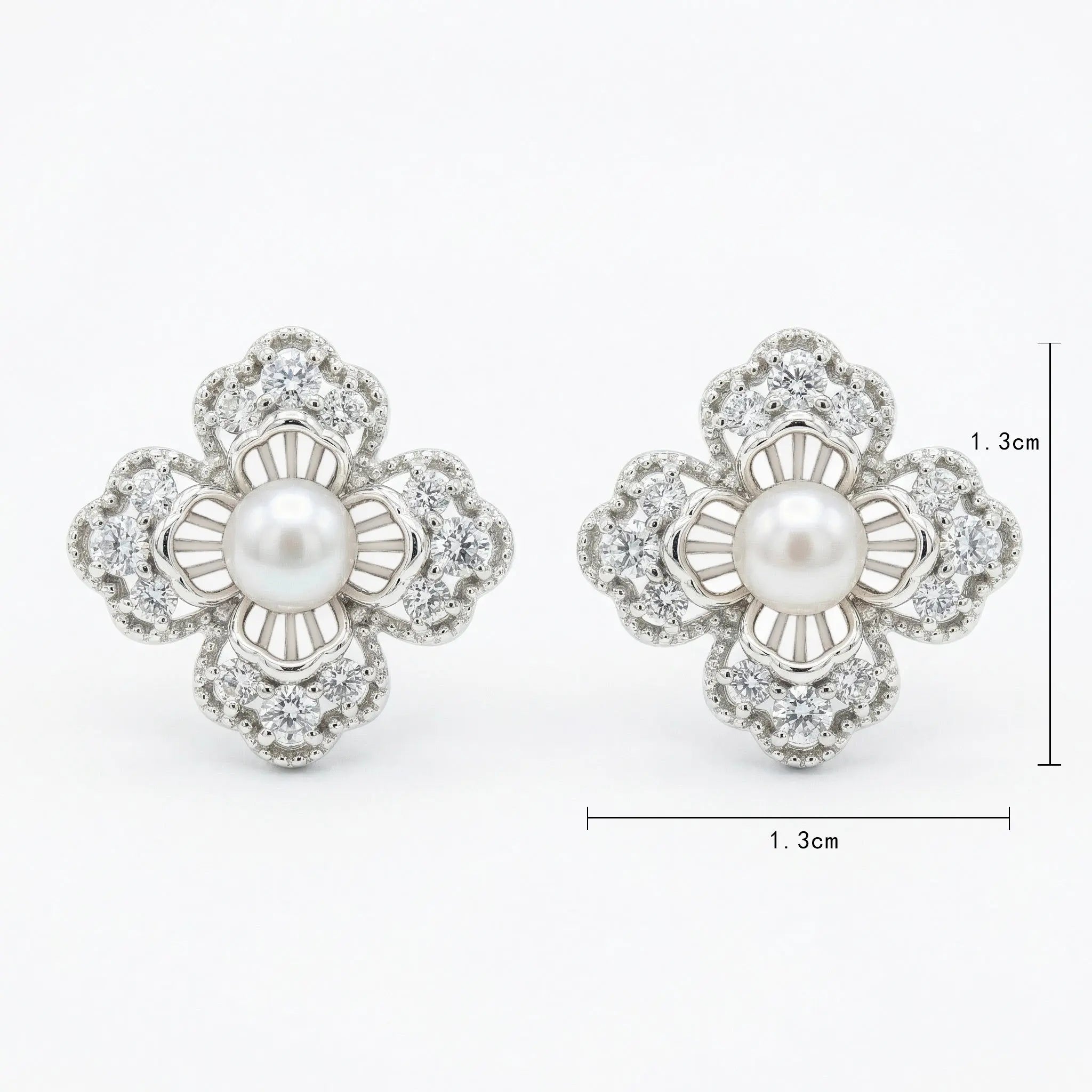 925 Sterling Silver Elegant Floral Pearl and Sparkling Accent Stud Earrings in White Metal