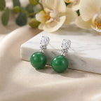 925 Sterling Silver Elegant Green Jade Drop Earrings with Sparkling Oval Gemstone Accents NP Collection