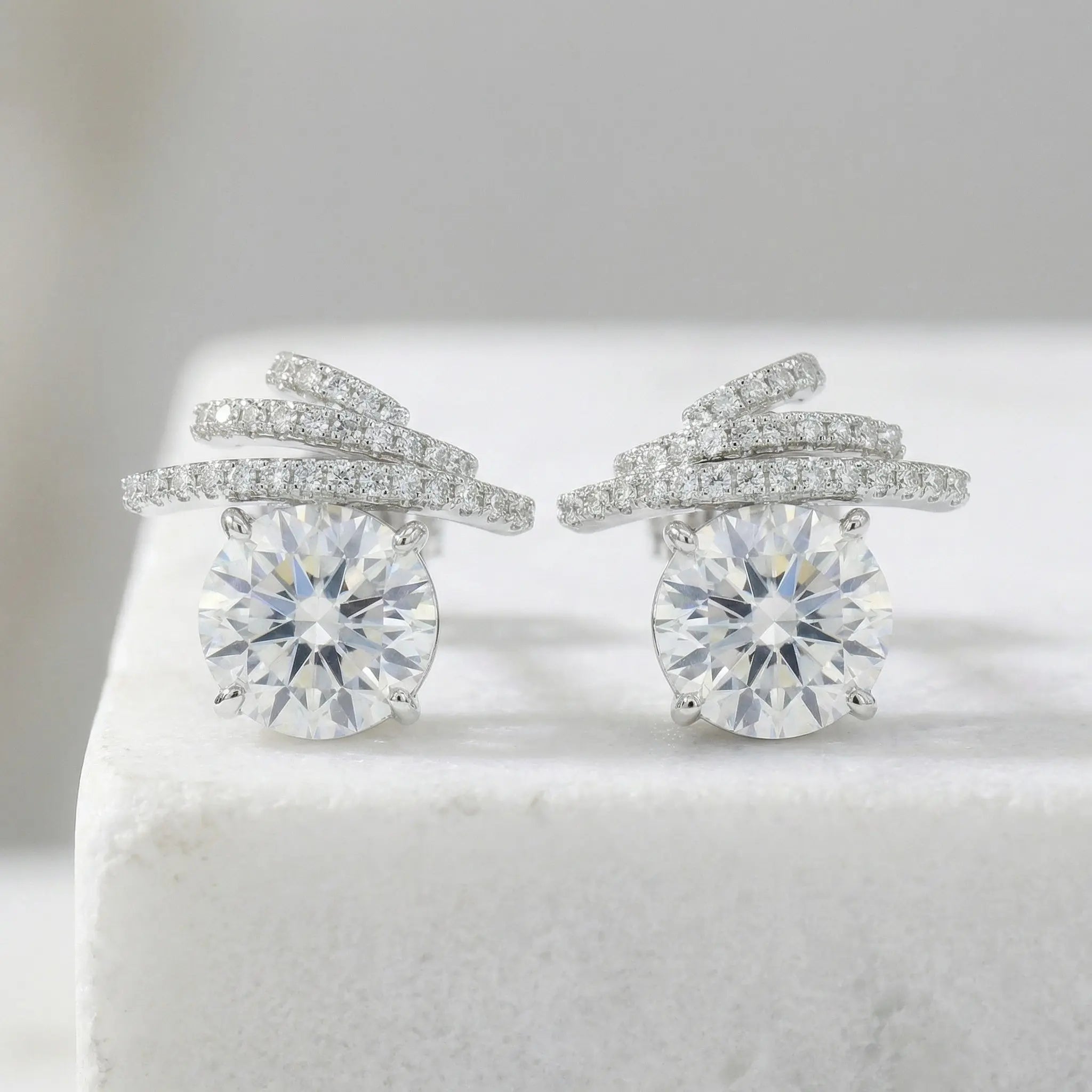 925 Sterling Silver Exquisite Radiant Sunny Earrings Studs with Sparkling Ribbon Accents and Shimmering Pavé Details NP Collection